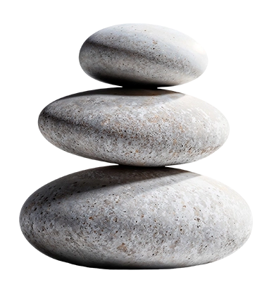 Trzy kamienie ułożone na sobie symbolizujące równowagę